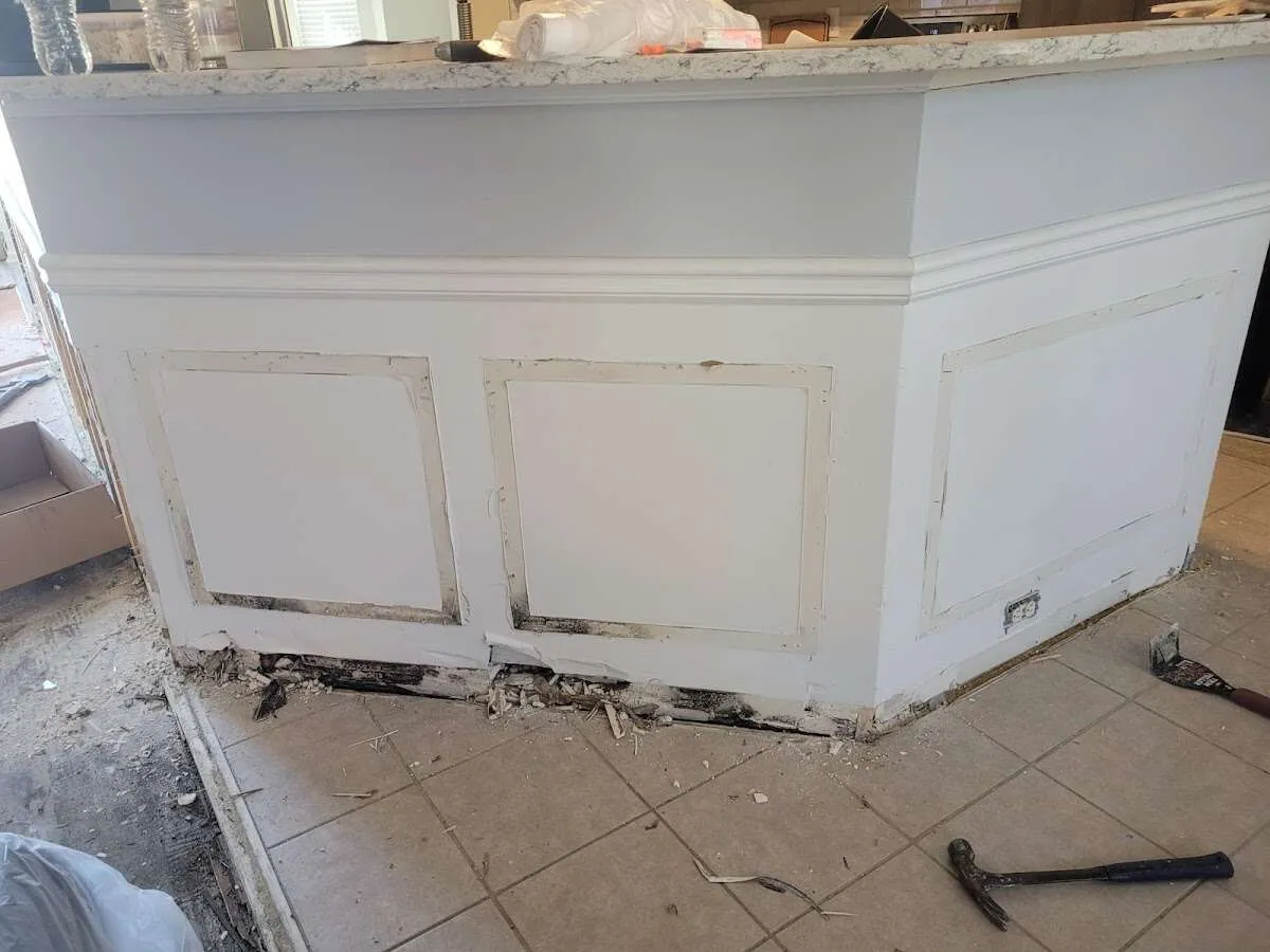 Water damage and mold on kitchen during Storm Damage Restoration in Grass Lake